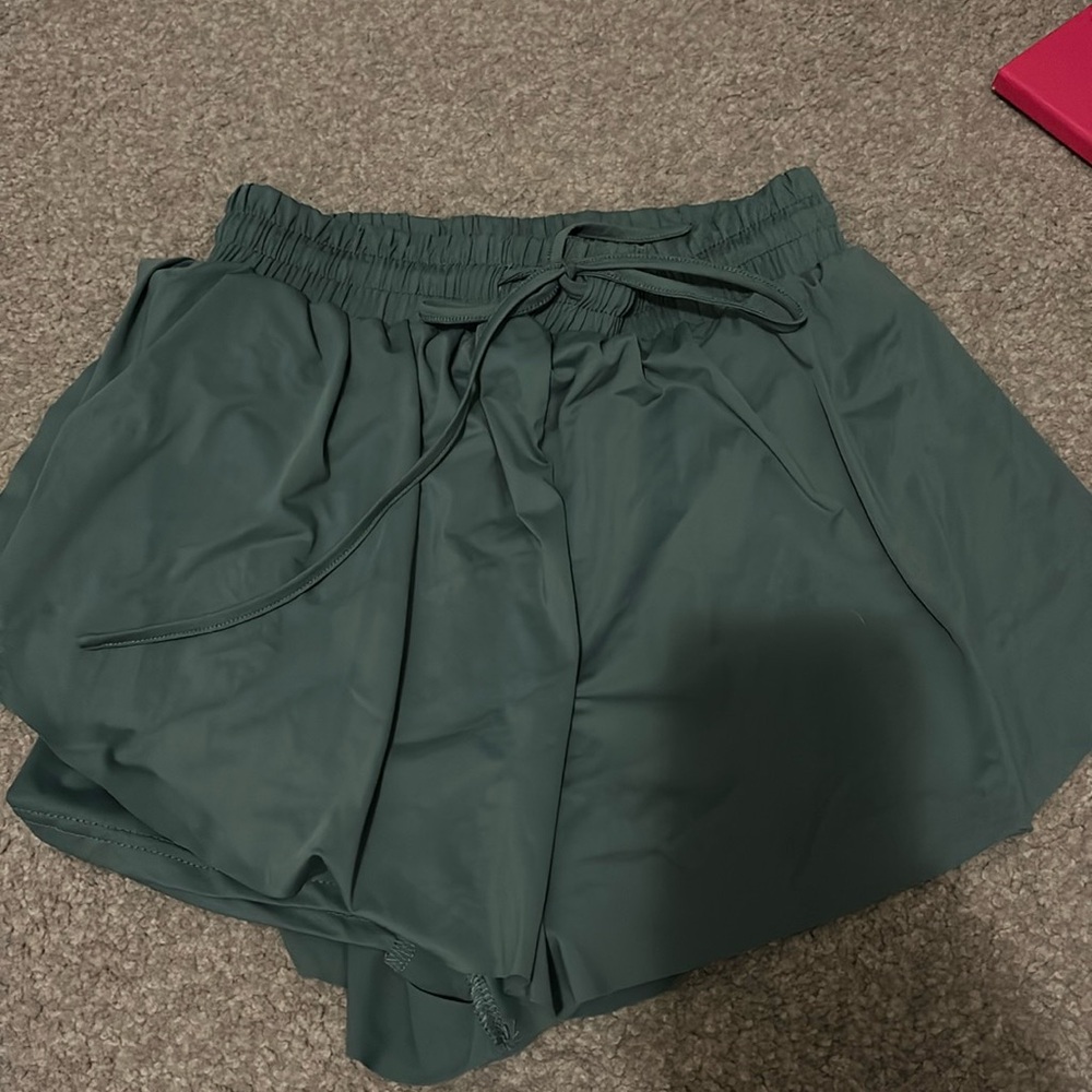 green flowy athletic shorts